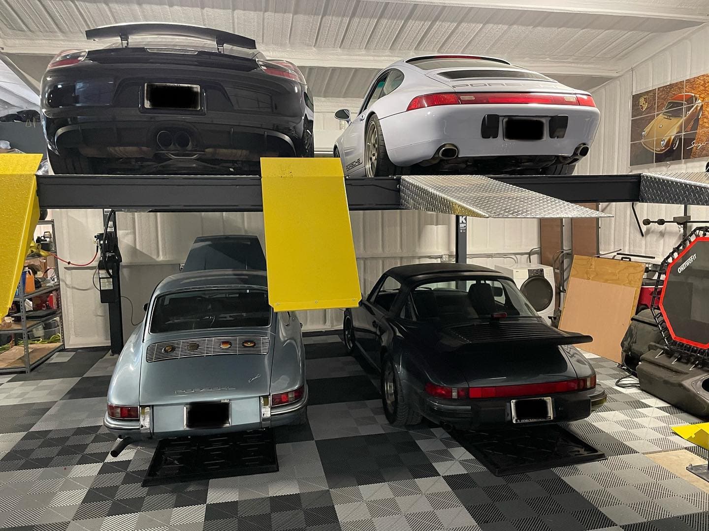 Premium garage with BendPak lift and Swisstrax flooring